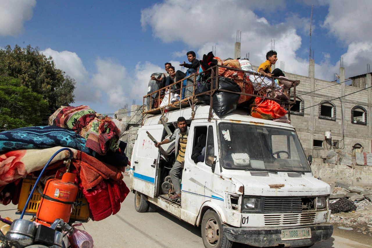 Displaced Palestinians travel in a vehicle as they flee Rafah, Gaza, May 12. 