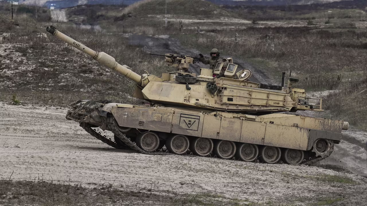 US soldiers from 2nd Battalion, 70th Armor Regiment, 1st Infantry Division train with M1A2 Abrams tanks in Nowa Deba, Poland, in April.