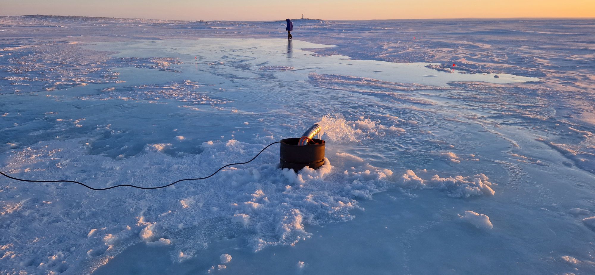 A Real Ice trial pumping seawater over the ice in Cambridge Bay, Canada, on 23 January 2024. The aim is to thicken and restore disappearing Arctic sea ice.