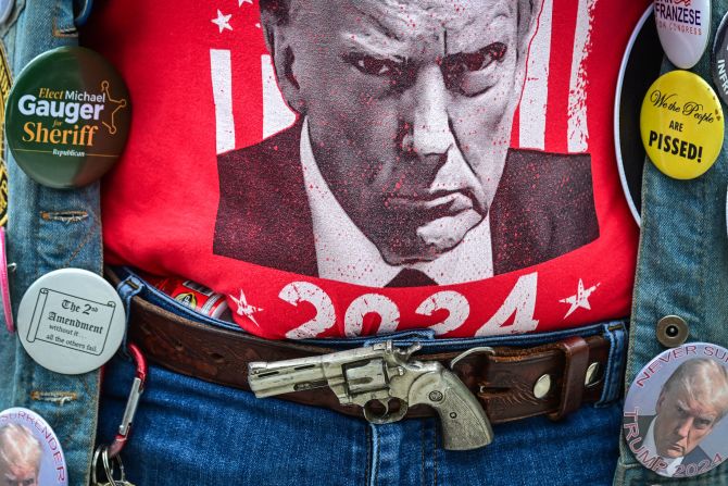 A supporter of former US President Donald Trump waits to enter the West Palm Convention Center for a campaign rally in West Palm Beach, Florida, on Friday, June 14.