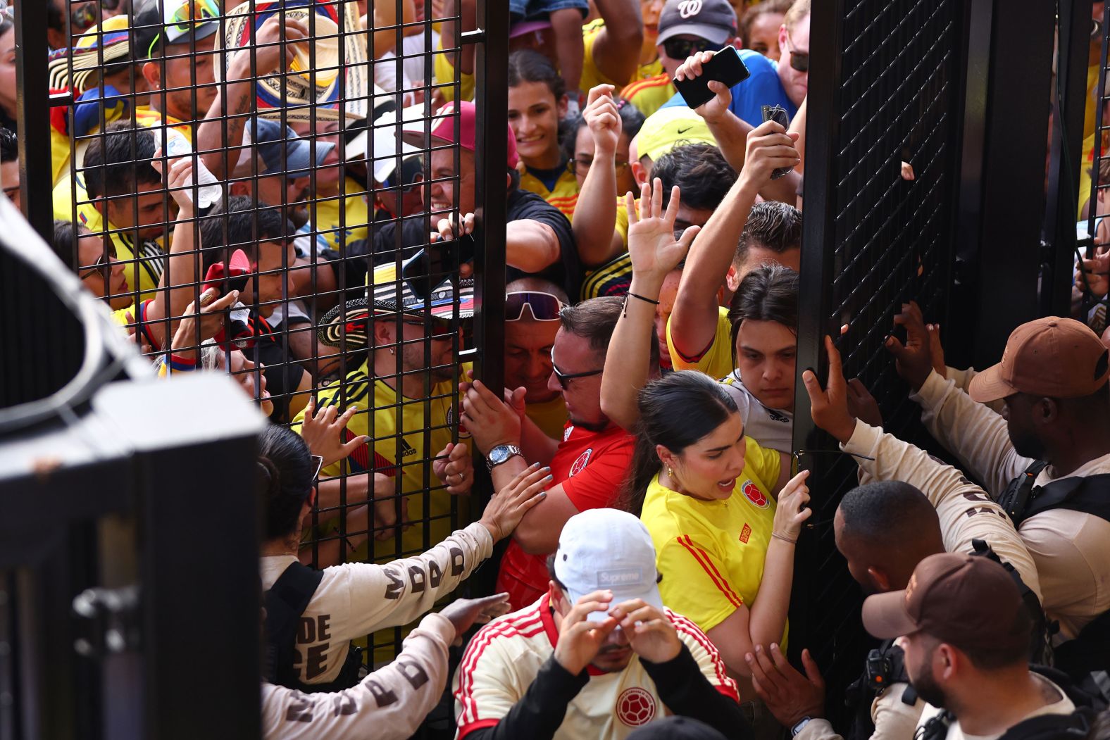 Soccer fans try to enter Hard Rock Stadium in Miami Gardens, Florida, to attend the Copa América final on Sunday, July 14. <a href="index.php?page=&url=https%3A%2F%2Fwww.cnn.com%2F2024%2F07%2F14%2Fsport%2Fcopa-america-final-argentina-colombia-tickets-spt-intl-hnk%2Findex.html">The game’s kickoff was delayed for more than an hour</a> because of massive overcrowding. A stadium spokesperson said thousands of fans without tickets tried to forcibly enter the stadium. The gates were opened for a short period of time to all fans “in order to prevent stampedes and serious injury at the perimeter,” a stadium spokesperson said.