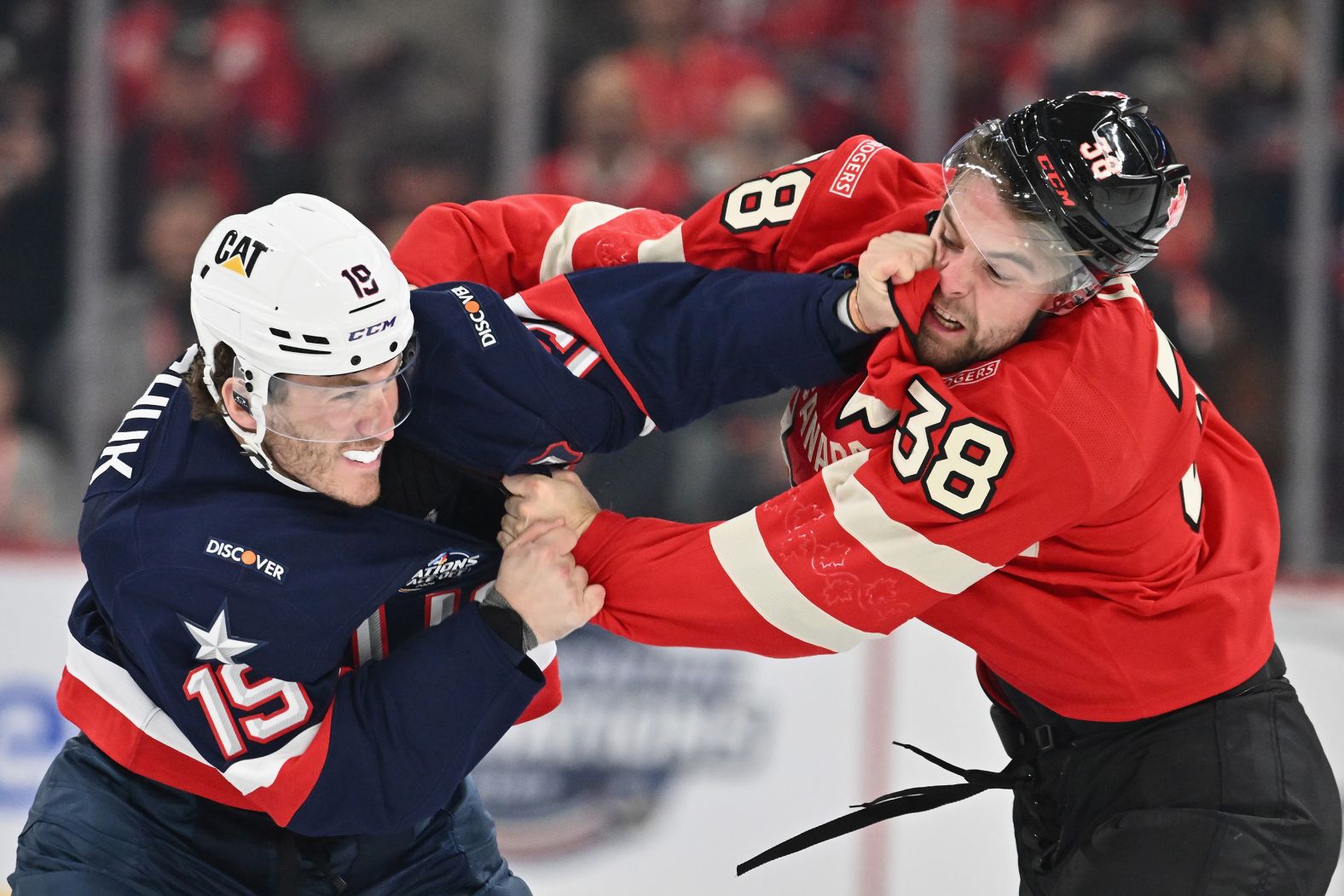 Team USA’s Matthew Tkachuk, left, fights Team Canada’s Brandon Hagel during a 4 Nations Face-Off game in Montreal on Saturday, February 15.