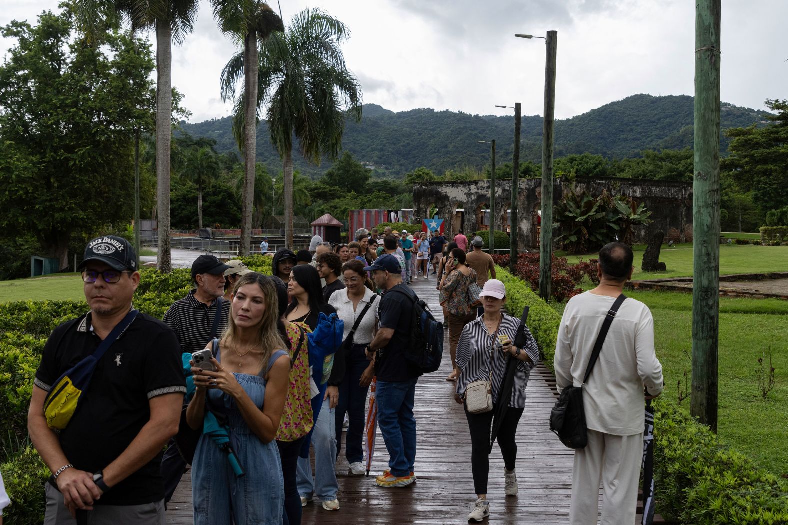 Voters wait in line in Caguas, Puerto Rico, on Tuesday.