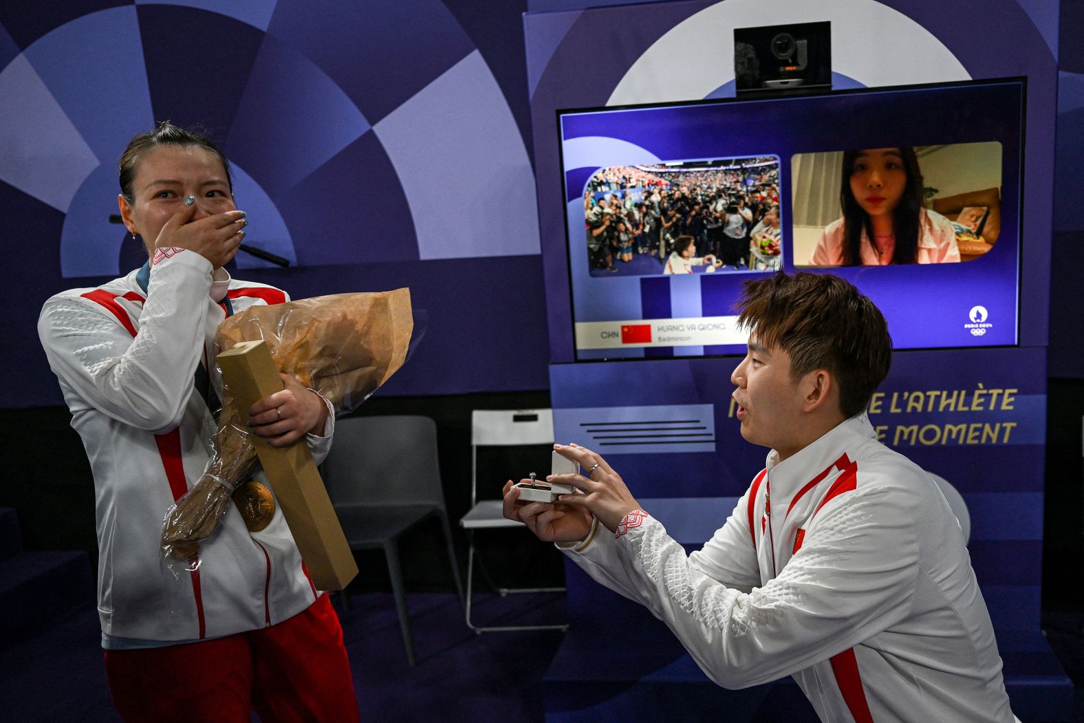 Chinese badminton player Liu Yuchen <a href="index.php?page=&url=https%3A%2F%2Fwww.cnn.com%2Fsport%2Flive-news%2Fparis-olympics-news-2024-08-02-24%23h_8d26bdbde4e45795009af410aee226a6">proposes to his girlfriend</a>, Huang Yaqiong, after she and Zheng Siwei won Olympic gold in mixed doubles on Friday, August 2.