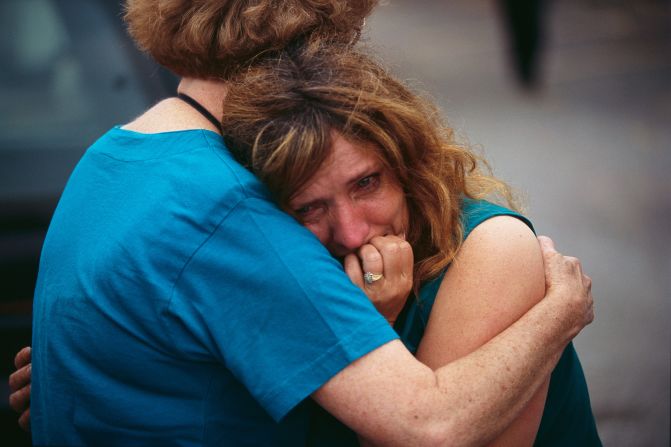 A woman grieves for family and friends lost in the attack.