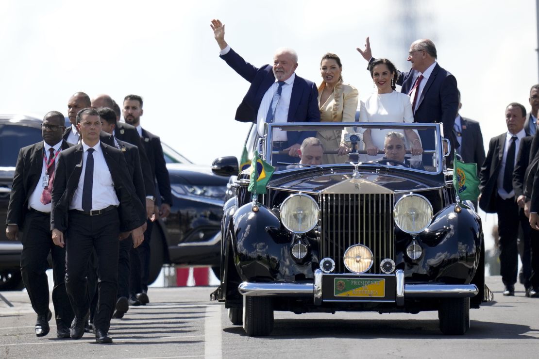Lula, his wife Rosangela Silva, Vice President-elect Geraldo Alckmin, right, and his wife, Maria Lucia Ribeiro, ride to Congress for their swearing-in ceremony, in Brasilia, Brazil, Sunday, Jan. 1, 2023.