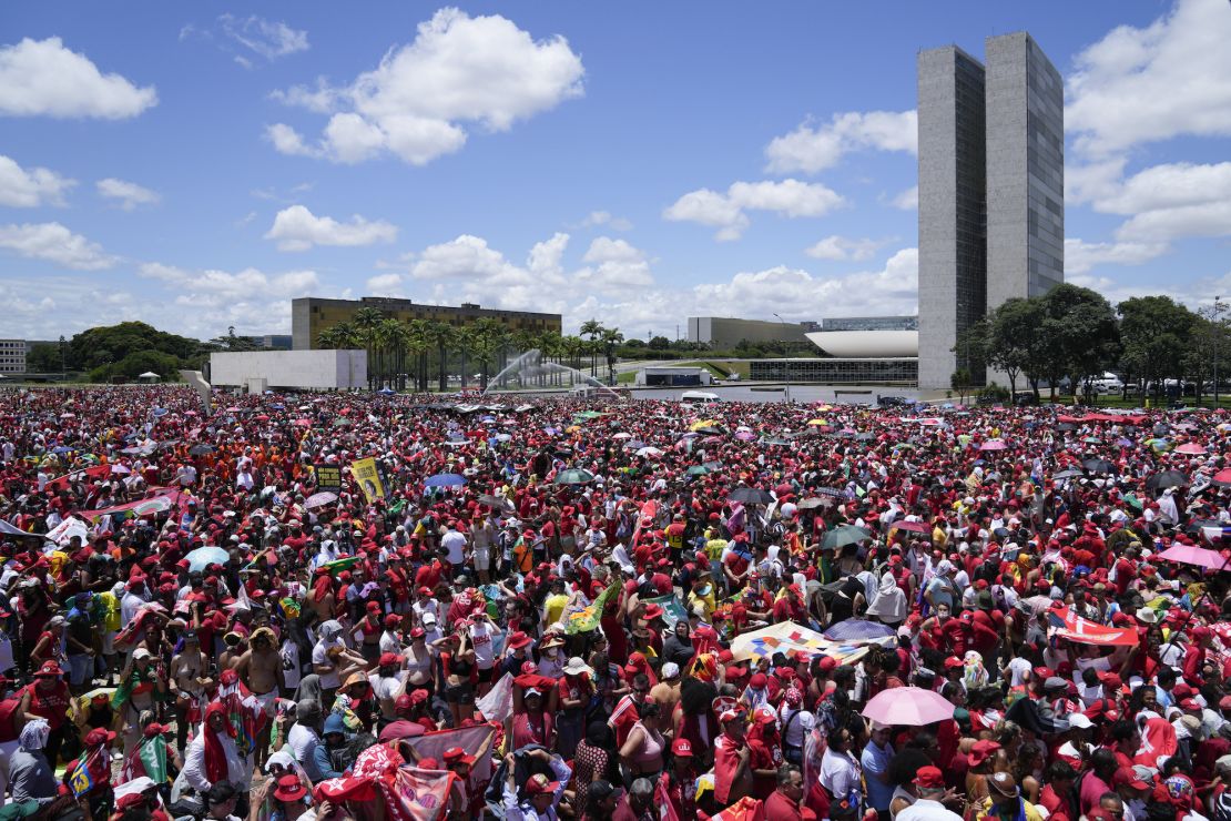 Lula supporters gather to attend his inauguration as new president, in Brasilia, Brazil, Sunday, Jan. 1, 2023. 
