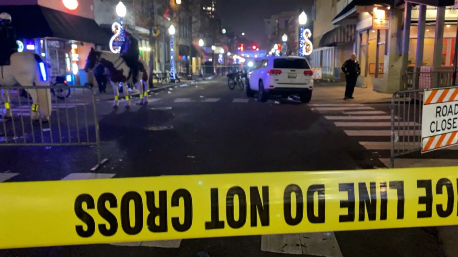 The scene of a shooting is seen on January 1, 2023, in Mobile, Alabama.