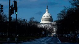 Sunlight falls on the US Capitol Building in Washington, DC on December 23, 2022. 