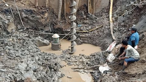 The boy is trapped at a bridge construction site in the Mekong Delta region.