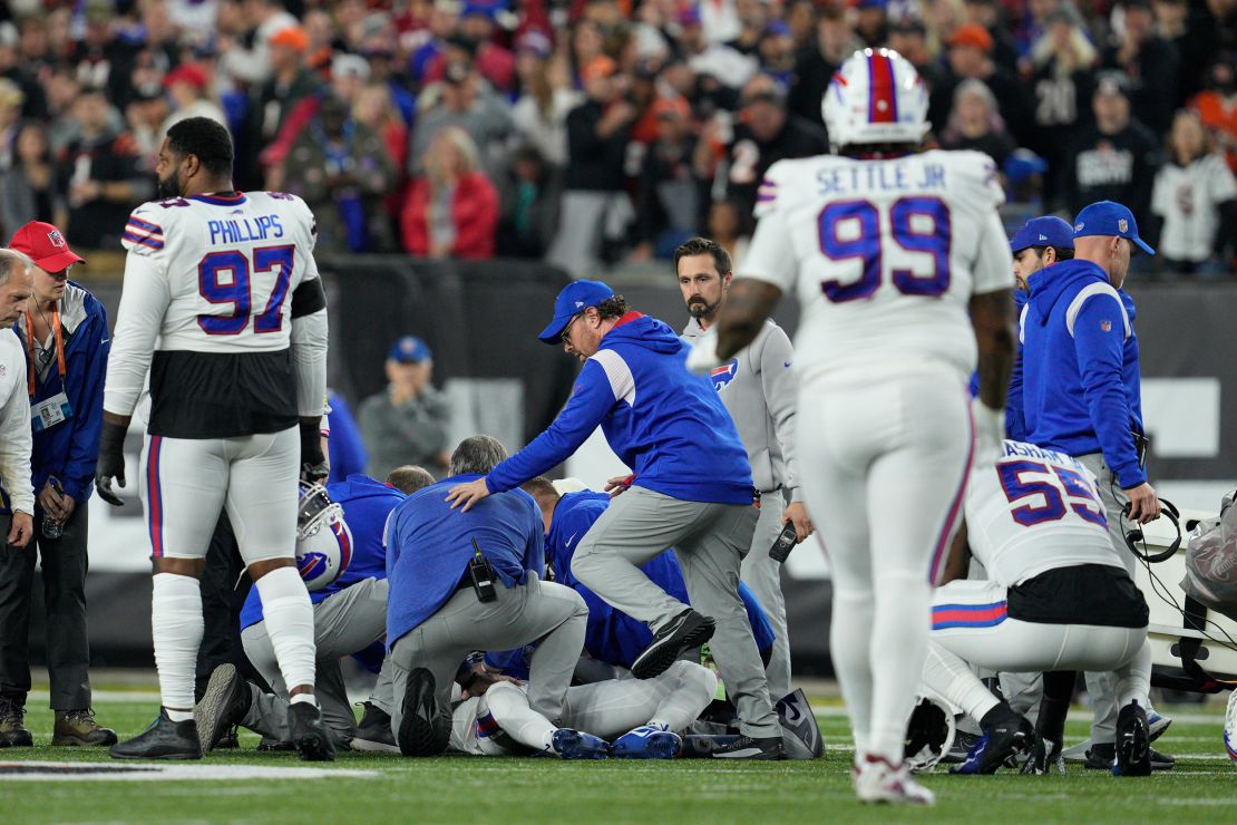 Hamlin is examined after collapsing on the field in the first quarter of Monday night's game between the Buffalo Bills and Cincinnati Bengals. 