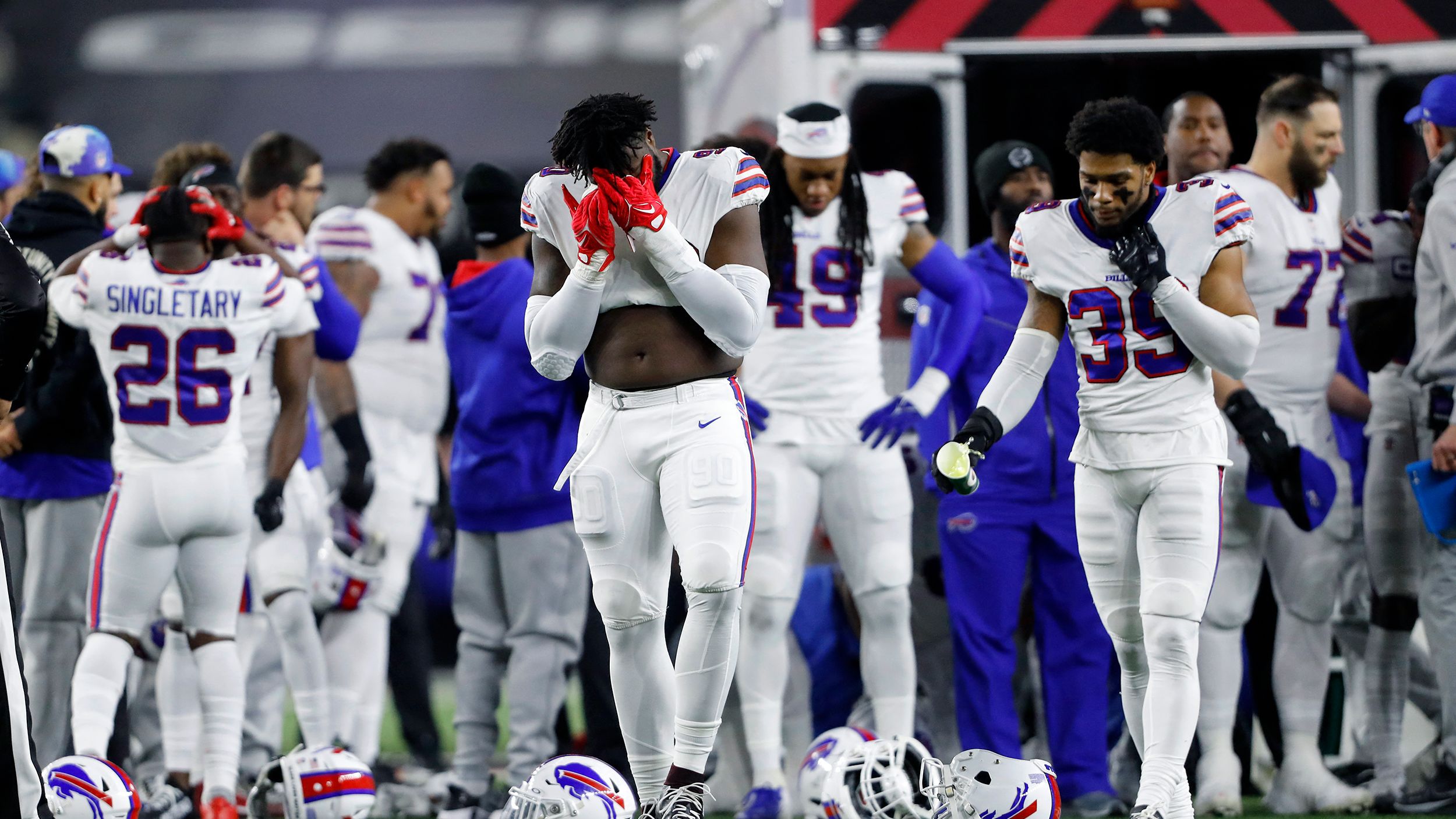 Buffalo Bills players react after teammate <a href="index.php?page=&url=http%3A%2F%2Fwww.cnn.com%2F2023%2F01%2F02%2Ffootball%2Fdamar-hamlin-buffalo-bills-collapse%2Findex.html" target="_blank">Damar Hamlin</a> collapsed on the field during the first quarter of the Monday Night Football game against the Cincinnati Bengals. Hamlin was administered CPR before being transported off the field in an ambulance.