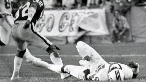 Oakland Raiders' Jack Tatum, left, struck New England Patriots receiver Darryl Stingley in a preseason game in August 1978, leaving him paralyzed.