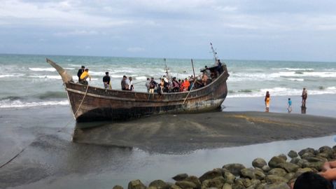 The rickety wooden boat that carried Hatemon Nesa and her daughter, Umme Salima pictured in Aceh province, Indonesia.