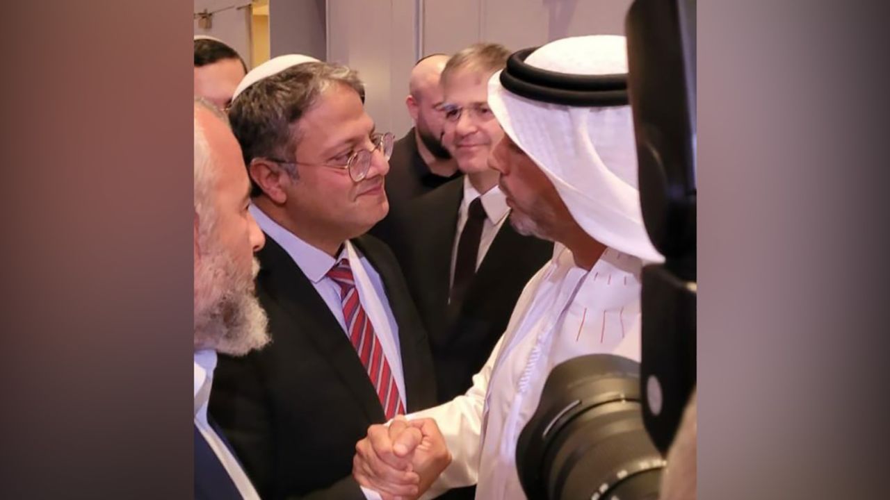 Israel's Itamar Ben Gvir and the United Arab Emirates' Ambassador to Israel Mohamed Al Khaja greet each other in Tel Aviv on December 1.