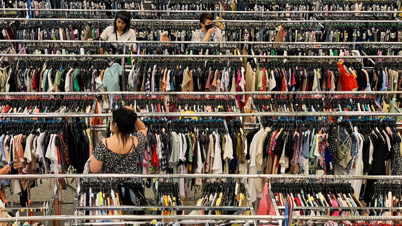 Customers browse racks of clothing at a discount department retail store in Las Vegas, Nevada, on May 7, 2022. (Photo by PATRICK T. FALLON/AFP via Getty Images)