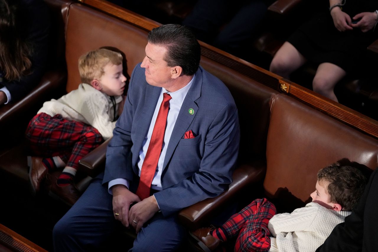US Rep. Kevin Mullin, a Democrat from California, sits with his children during one of Tuesday's votes.