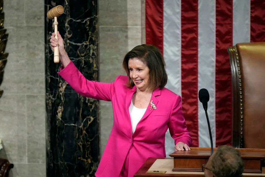Pelosi holds the gavel as she calls the House to order on Tuesday.