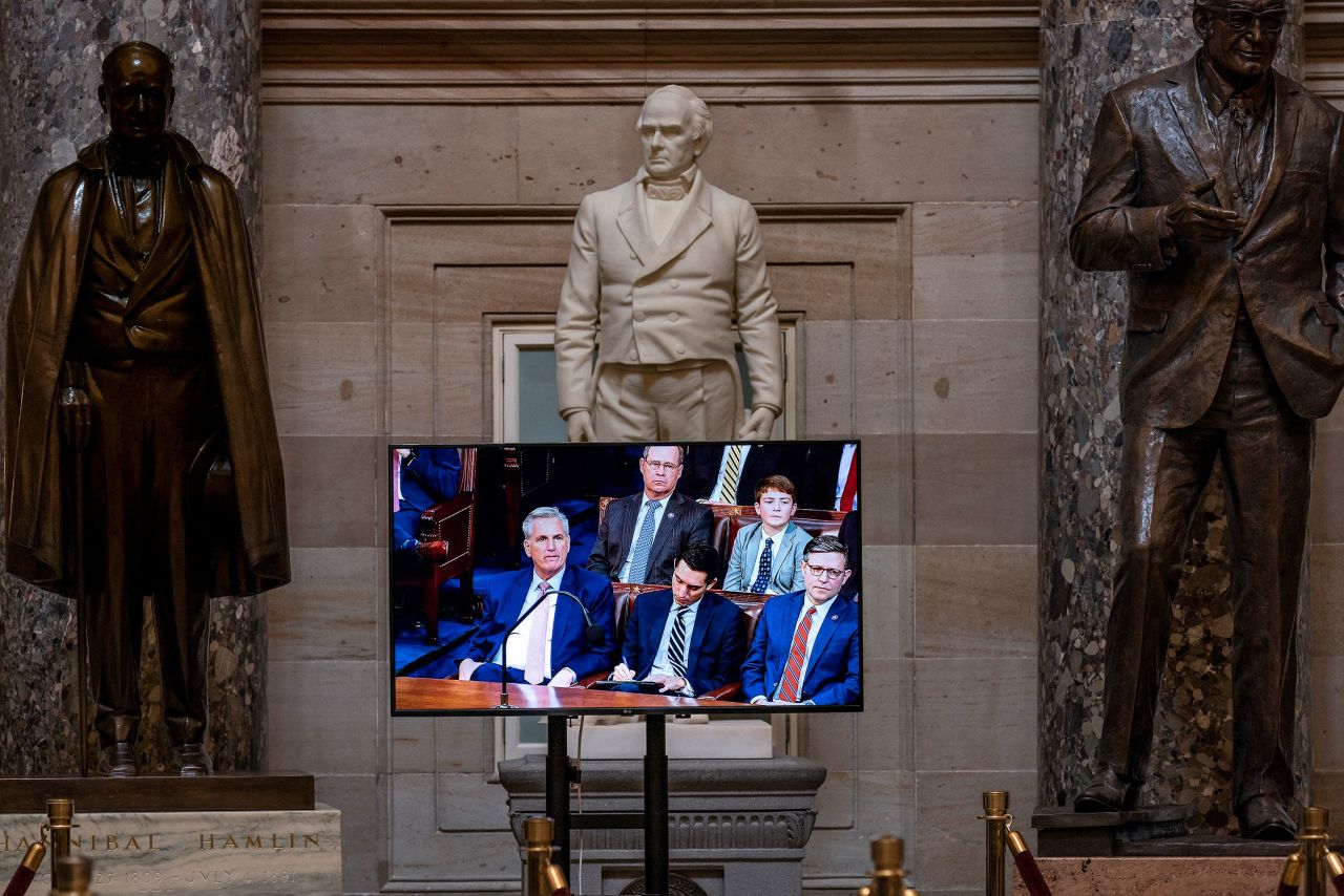 A video monitor at the Capitol displays a live feed of the House chamber on Tuesday.