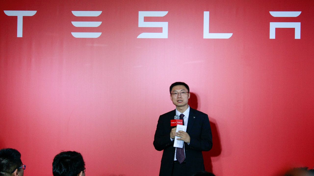 Tom Zhu, Tesla's executive in charge of China, speaks as a new Tesla experience store opens near West Lake on August 18, 2015 in Hangzhou, China.