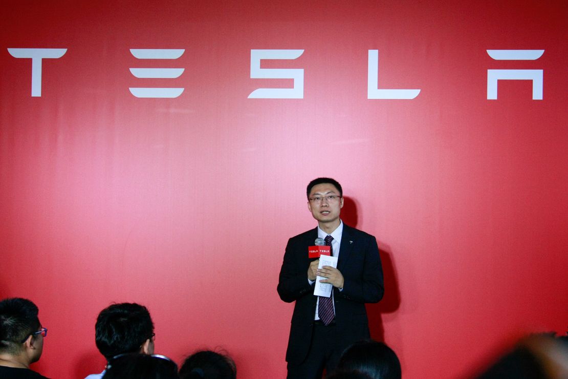 Tom Zhu, Tesla's executive in charge of China, speaks as a new Tesla experience store opens near West Lake on August 18, 2015 in Hangzhou, China.