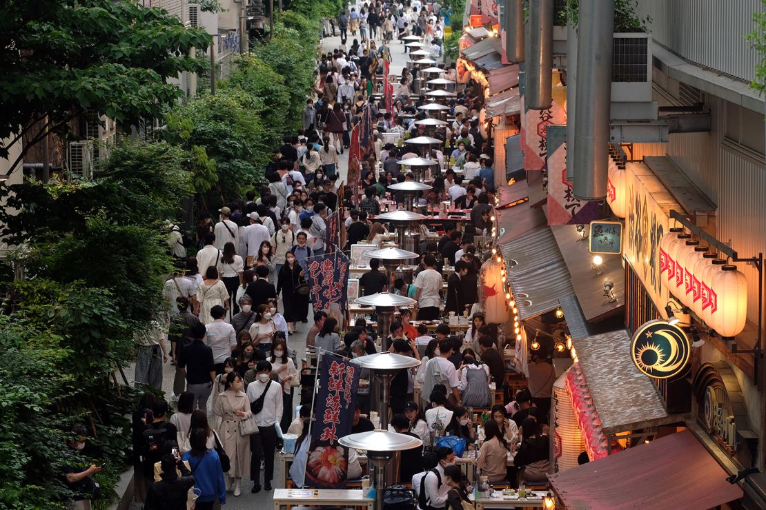 A crowd outside the restaurants near Tokyo's Miyashita Park on May 22, 2022. 