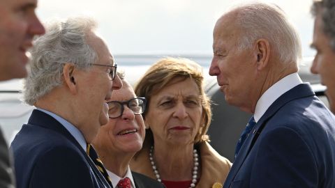 US President Joe Biden (2nd R) greets US Senate Minority Leader Mitch McConnell (2nd L), Ohio Governor Mike DeWine (3rd L) and his wife, Frances DeWine (C), on arrival at Cincinnati Northern Kentucky International Airport in Hebron, Kentucky on January 4, 2023. (Photo by Jim WATSON / AFP) (Photo by JIM WATSON/AFP via Getty Images)