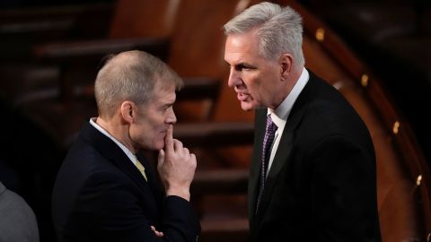 Rep. Jim Jordan talks with  McCarthy in the House chamber as the House meets on January 4, 2023, to elect a speaker.