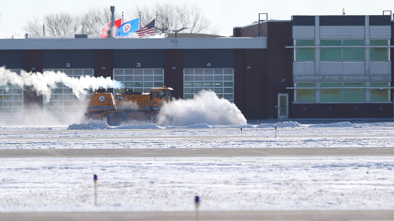 Minneapolis-St. Paul International Airport grounds crews keep the runways clear of blowing snow on January 30, 2019 in Bloomington, Minnesota. 