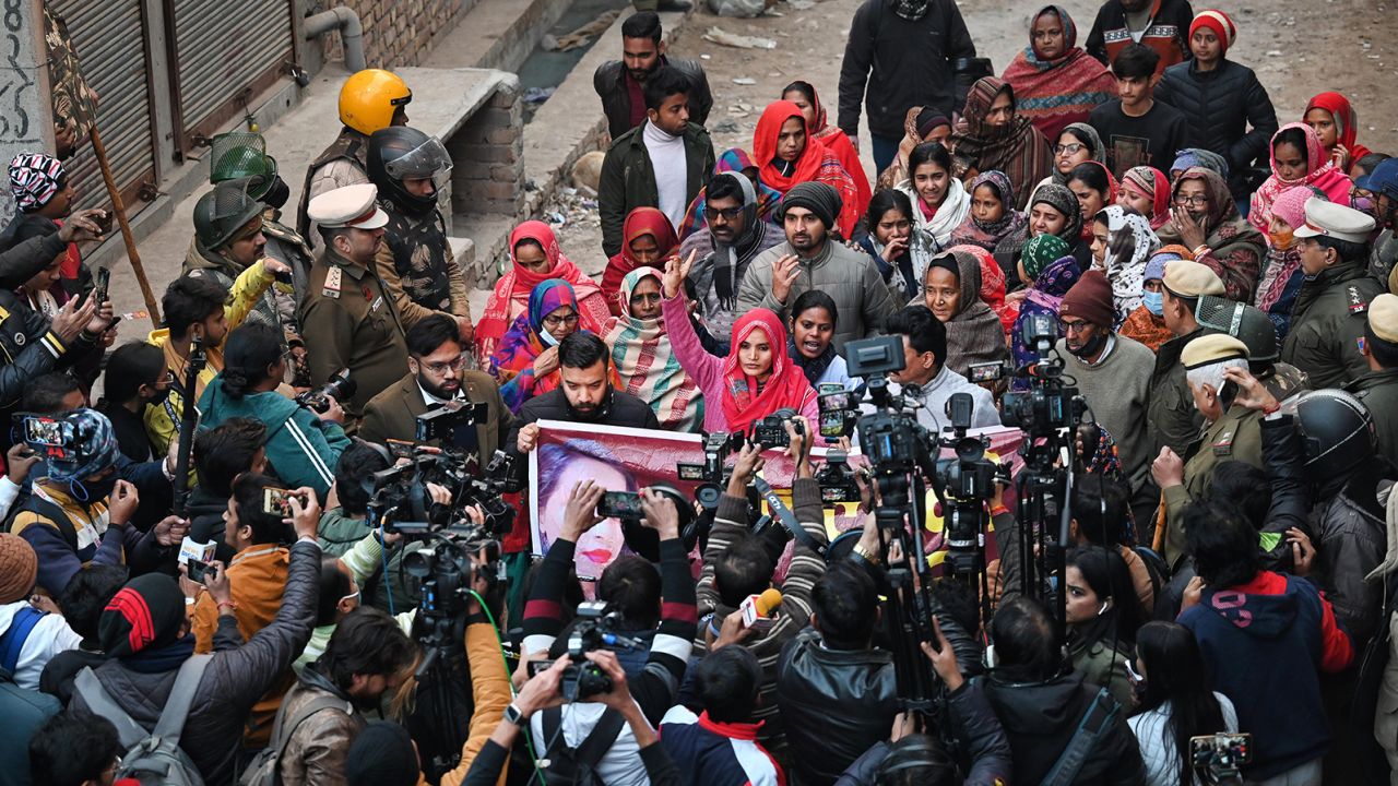 Crowds demand justice for the woman in New Delhi on January 3, 2022.