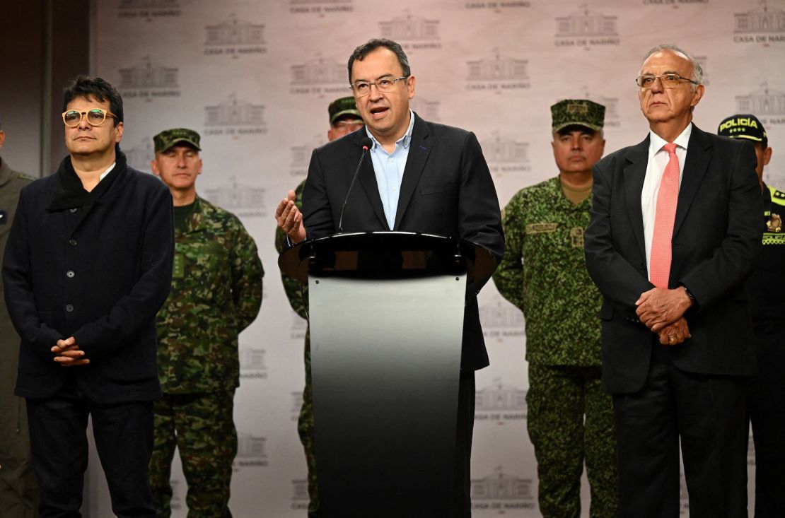 Interior minister Alfonso Prada speaks next to the High Commissioner for Peace, Danilo Rueda (L), and the Minister of Defense, Ivan Velasquez (R), during a press conference in Bogota on January 4, 2023. 
