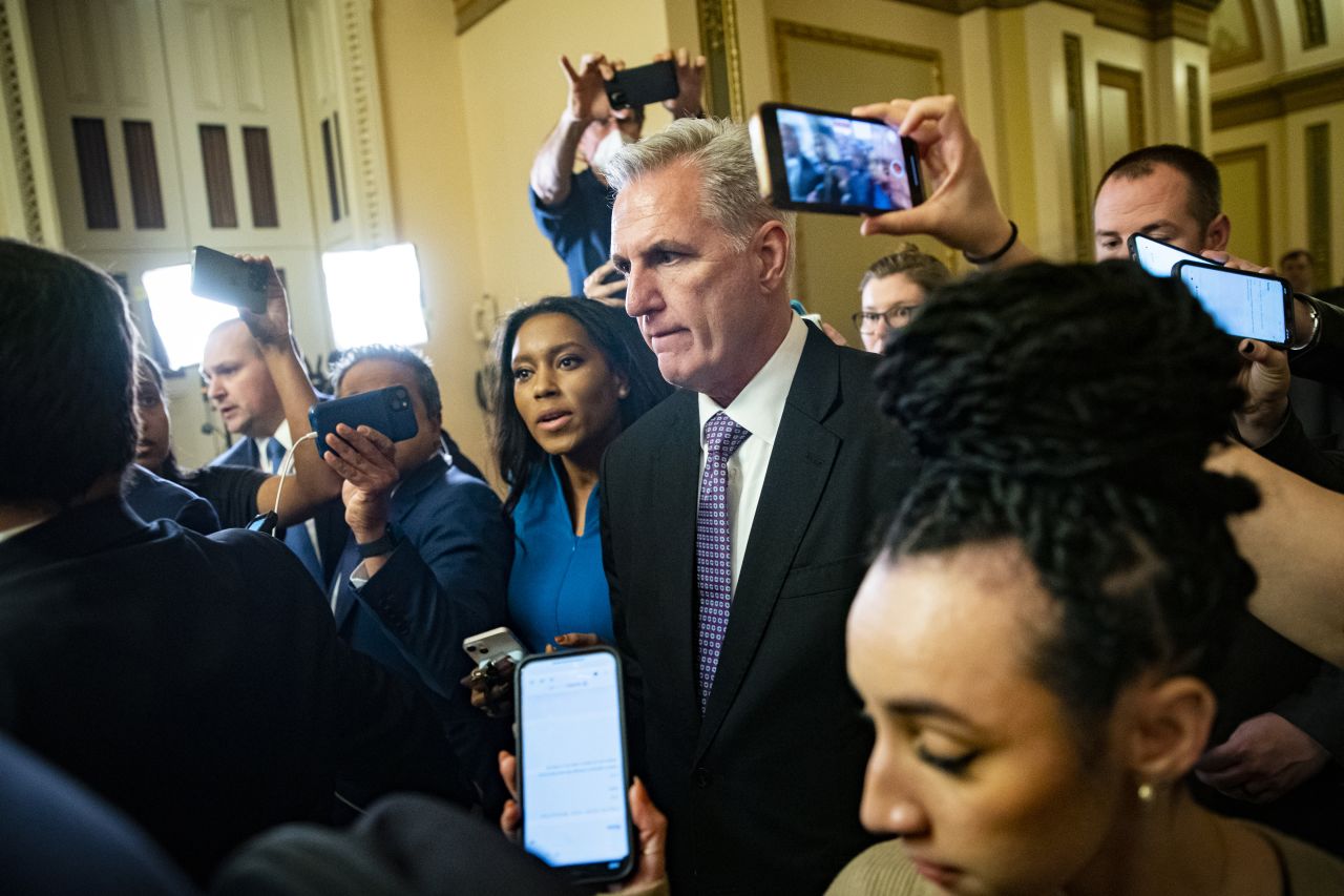 McCarthy speaks with members of the media as he leaves the House chamber on Wednesday.