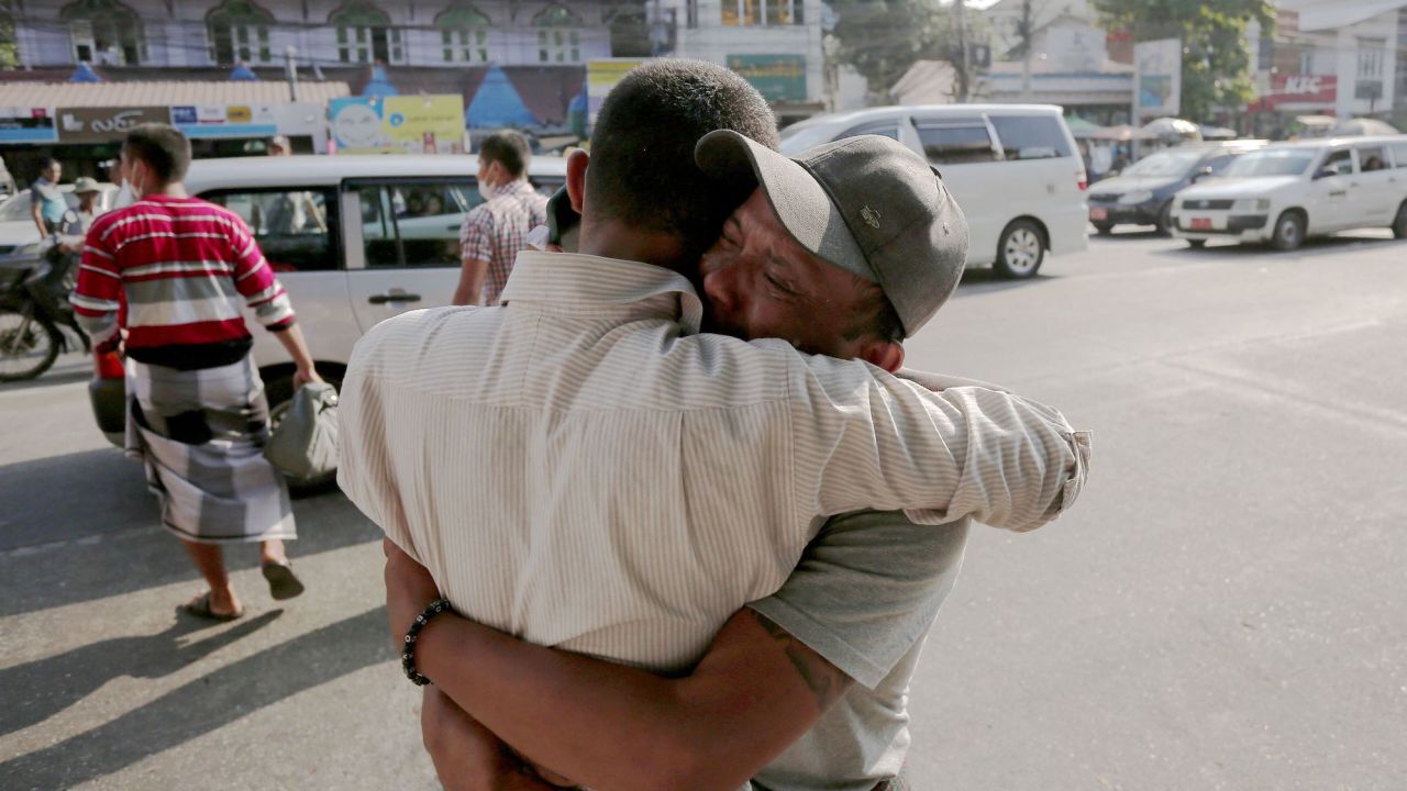 A man celebrates with a relative after being released from Insein Prison in Yangon, Myanmar on January 4.