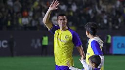 Portuguese forward Cristiano Ronaldo greets the crowd alongside his children at the Mrsool Park Stadium in the Saudi capital Riyadh on January 3.