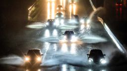 Drivers barrel into standing water on Interstate 101 in San Francisco, California on January 4, 2023. - A bomb cyclone smashed into California on January 4, 2023, bringing powerful winds and torrential rain that was expected to cause flooding in areas already saturated by consecutive storms.