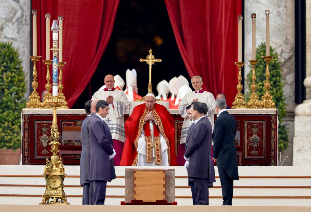 Pallbearers stand next to the coffin of former Pope Benedict as Pope Francis presides over the ceremonies, in St. Peter's Square at the Vatican, on January 5.