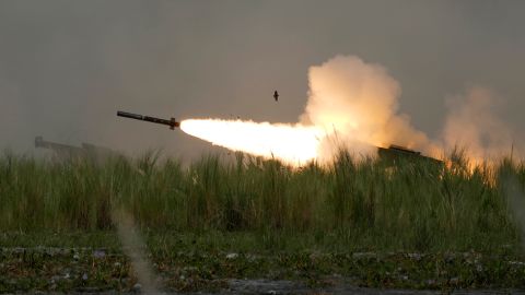 A US M142 High Mobility Artillery Rocket System (HIMARS) fires a missile during annual combat drills between the Philippine Marine Corps and US Marine Corps in Capas, Philippines, on October 13, 2022. 
