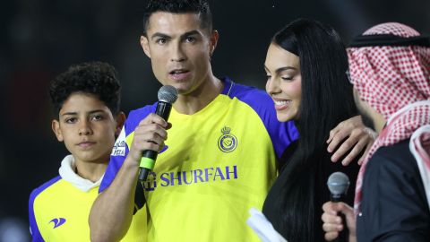  Portuguese forward Cristiano Ronaldo, his partner Georgina Rodriguez and his son Cristiano Ronaldo Jr, greets the crowd at the Mrsool Park Stadium.