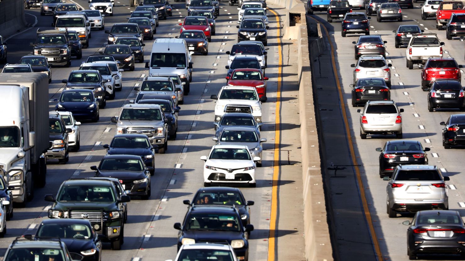Heavy traffic moves along the 101 freeway in Los Angeles. The EPA is proposing a new standard for fine particulate matter pollution, one source of which is the burning of gasoline and diesel fuel.
