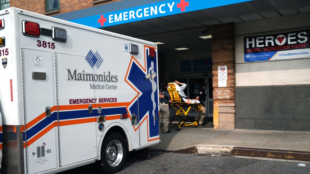 Medical workers deliver a patient to the Maimonides Medical Center on September 14, 2020 in the Brooklyn borough of New York City. 