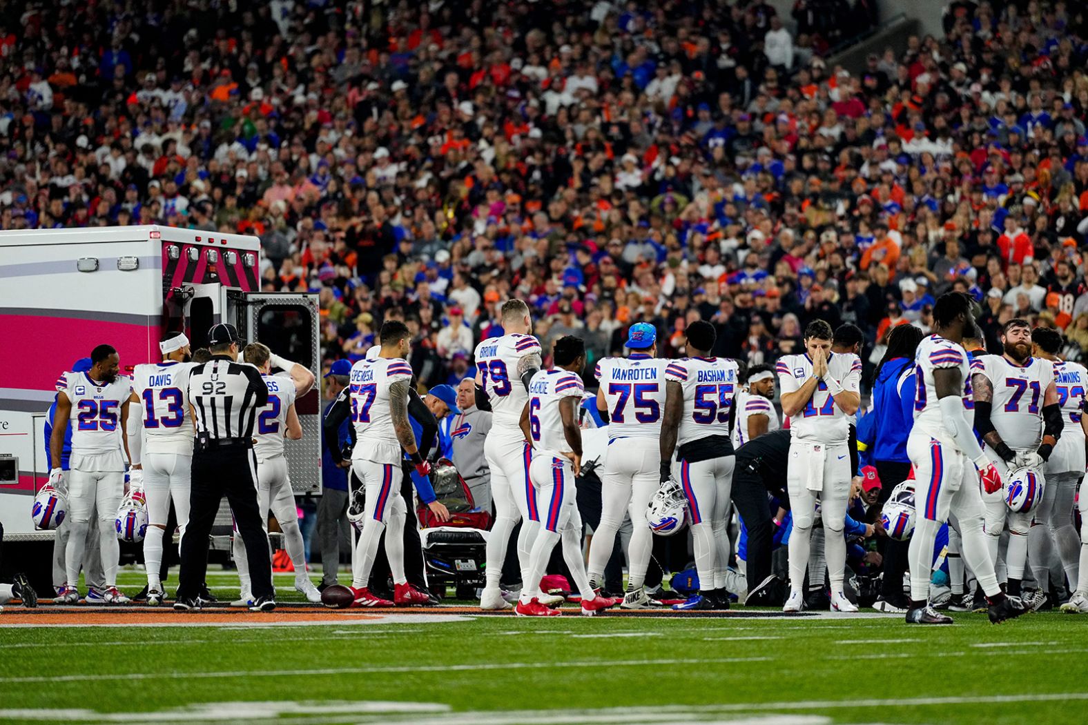 Buffalo Bills players react after teammate Damar Hamlin suffered cardiac arrest and collapsed on the field during an NFL game against the Cincinnati Bengals on Monday, January 2. Hamlin was resuscitated and intubated on the field, according to Dr. William Knight IV, a professor with the University of Cincinnati's department of emergency medicine. He was still critically ill as of Thursday, but he was awake and <a href="index.php?page=&url=https%3A%2F%2Fwww.cnn.com%2F2023%2F01%2F05%2Fsport%2Fdamar-hamlin-collapse-bills-status-thursday%2Findex.html" target="_blank">showing signs of improvement</a>, doctors said.