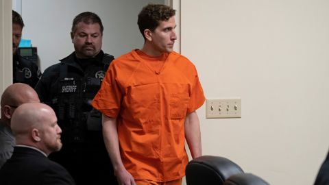Brian Kohberger, right, who is accused of killing four University of Idaho students in November 2022, is led into a courtroom for a hearing Thursday in Latah County District Court in Moscow, Idaho. 