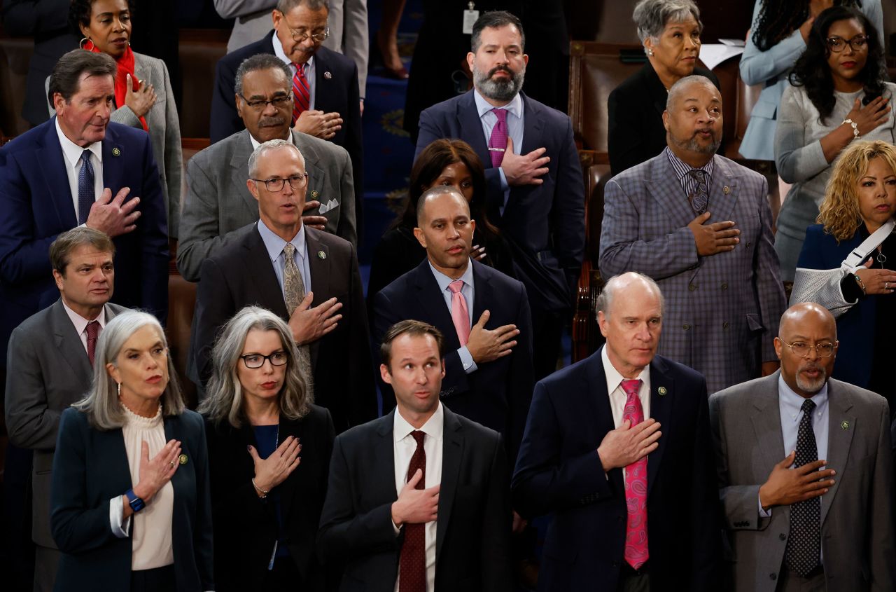 Jeffries and others recite the Pledge of Allegiance before the start of voting on Thursday.