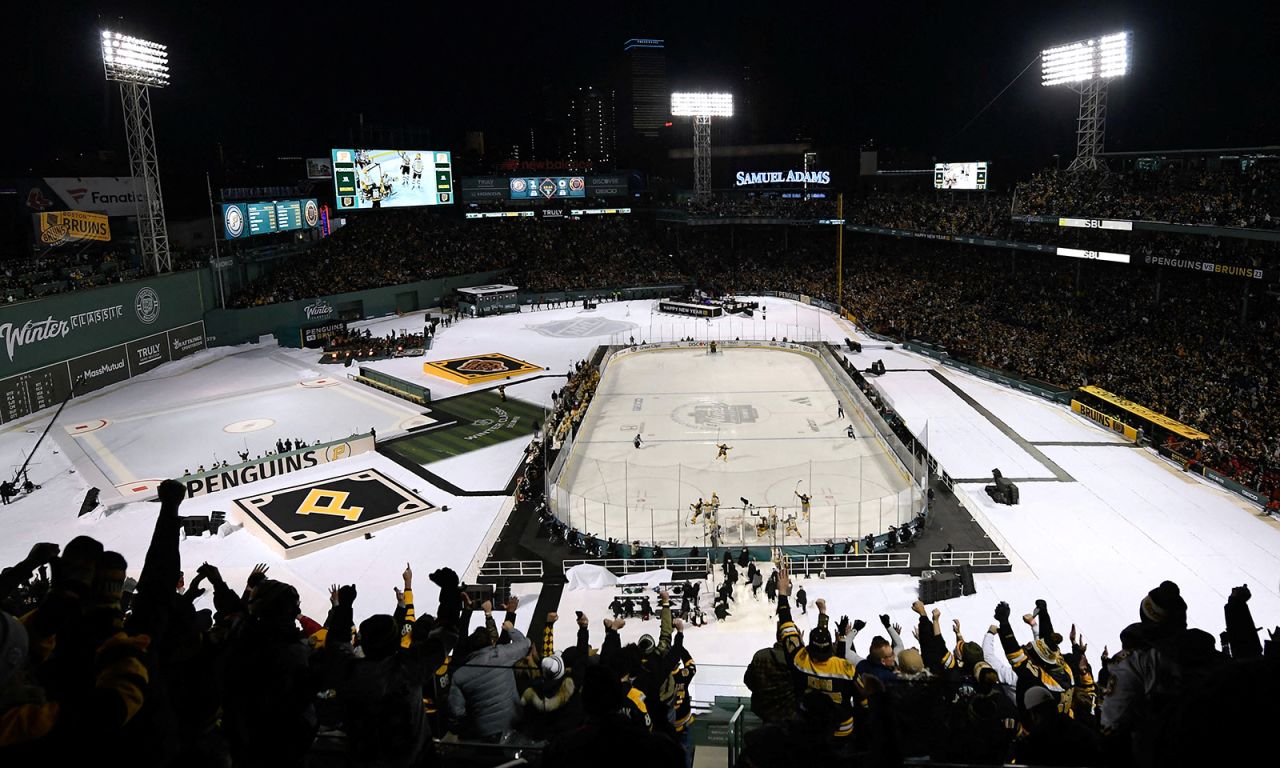 Fans react after the Boston Bruins' Jake DeBrusk scored a goal against Pittsburgh during the NHL's Winter Classic game on Monday, January 2. The annual outdoor game was played at Boston's Fenway Park this year. The Bruins won 2-1.