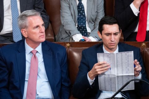 Republican leader Kevin McCarthy, left, and an aide wait for a final tally of votes on Tuesday, January 3. McCarthy is seeking to become the next speaker of the US House of Representatives, but as of Thursday afternoon he had yet to secure enough support to win the speakership.