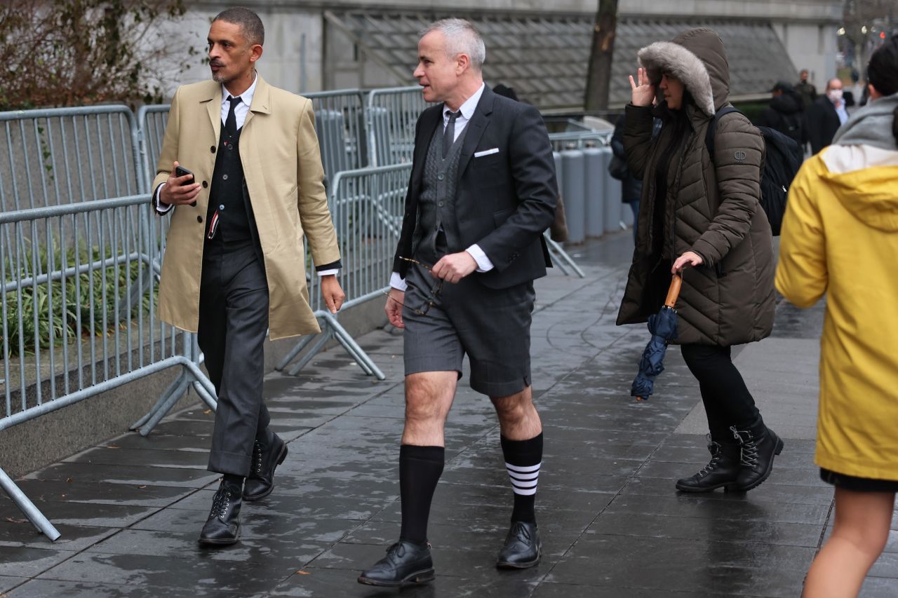 Fashion Designer Thom Browne arrives to court on January 3 wearing one of his brand's signature four-striped socks. 