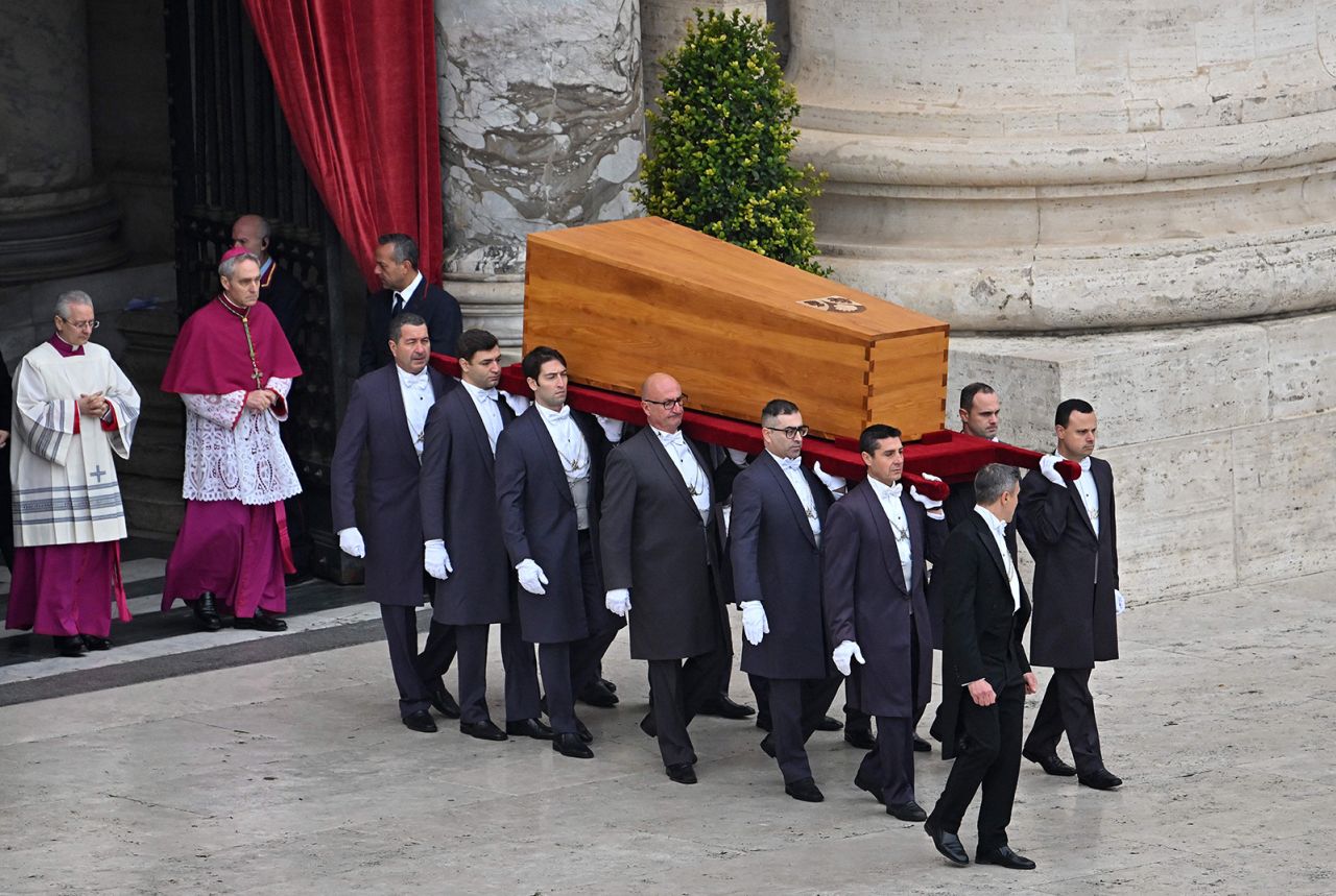 Pallbearers carry the coffin of Pope Emeritus Benedict XVI at the start of his funeral mass at St. Peter's Square in the Vatican, on January 5.