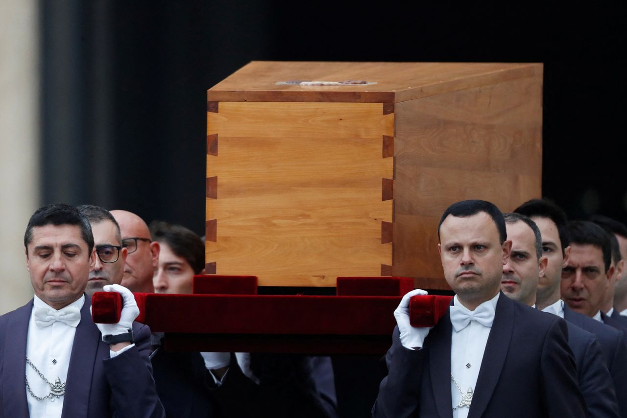 The coffin of former Pope Benedict is carried during his funeral, in St. Peter's Square at the Vatican.