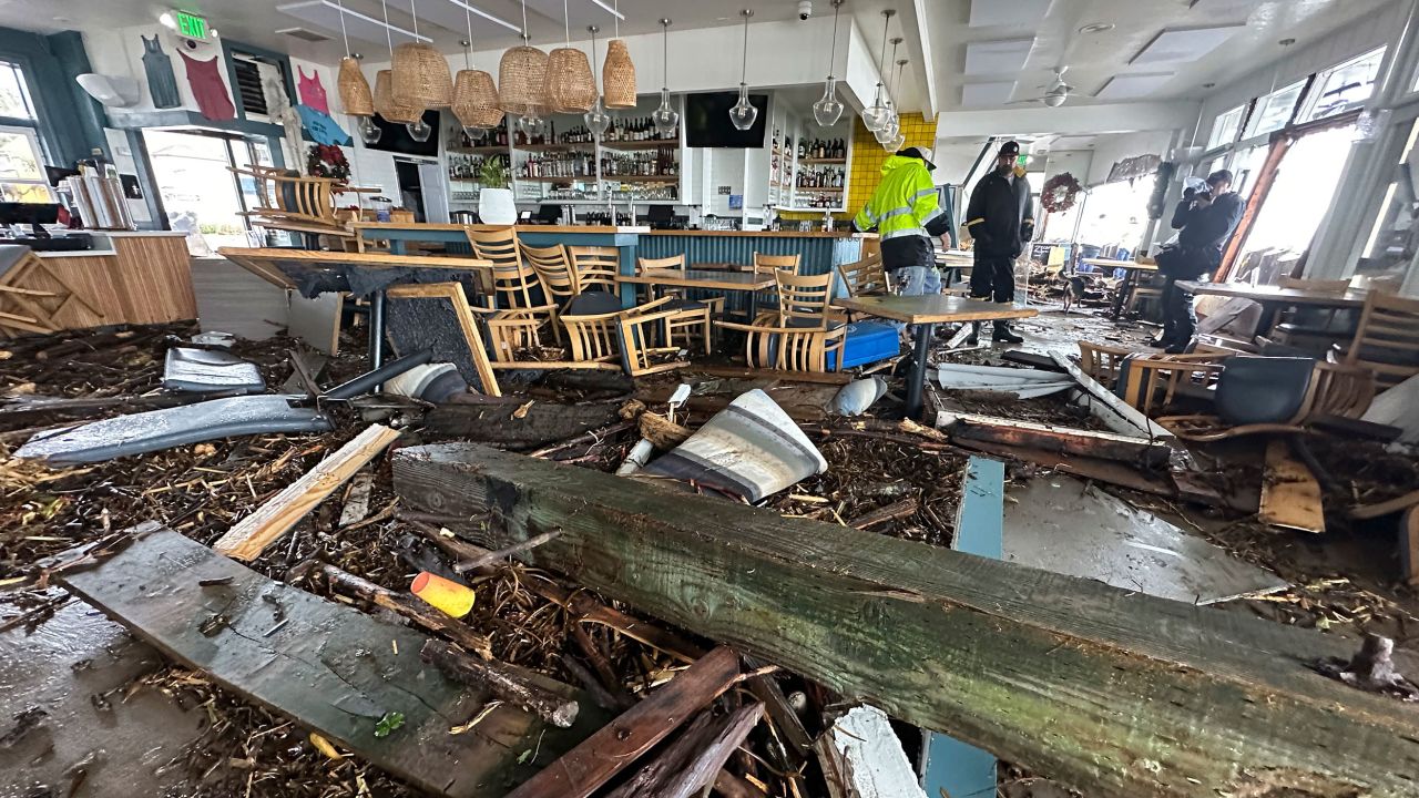 A support piece from the Capitola Wharf is seen inside the storm-damaged Zelda's restaurant in Capitola on January 5, 2023.