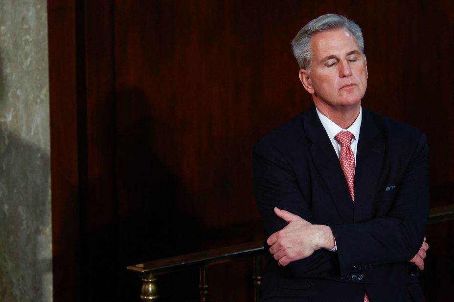 McCarthy stands alone at the back of the House chamber on Thursday after the 10th failed vote for House speaker.
